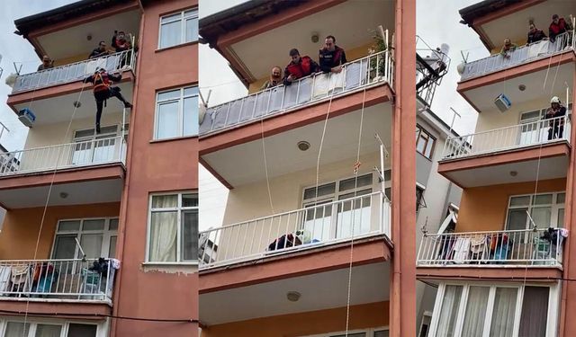 İtfaiyeden balkonda mahsur kalan kedi operasyonu